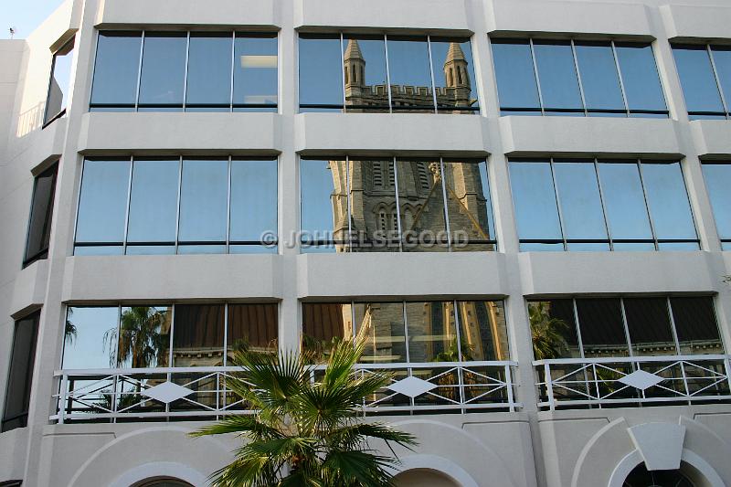 IMG_JE.HAM63.JPG - Reflection of Anglican Cathedral in office building, Hamilton, Bermuda