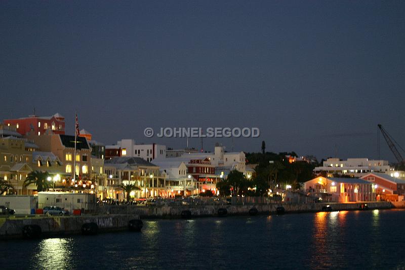 IMG_JE.SUN04.JPG - Evening lights, Front Street , Hamilton from the harbour, Bermuda after dark, sunset